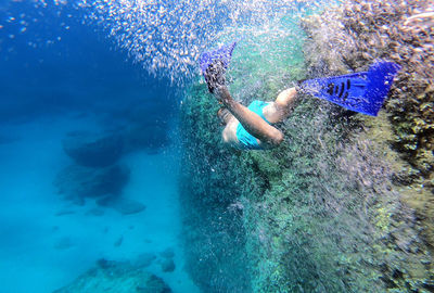 Man swimming in sea