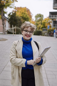 Smiling woman looking at camera