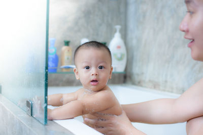 Portrait of shirtless baby girl