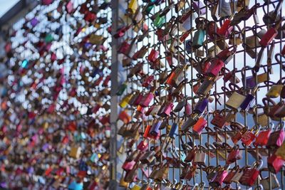 Full frame shot of padlocks hanging on metal