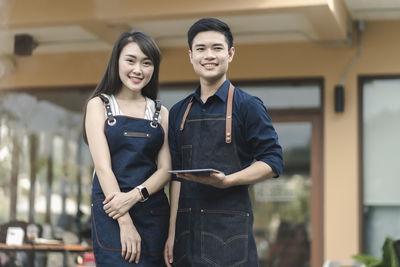 Portrait of a smiling young couple