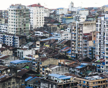 High angle view of buildings in city against sky