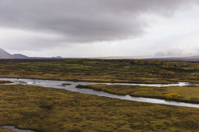 Scenic view of land against sky