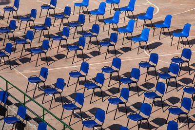 High angle view of chairs in row