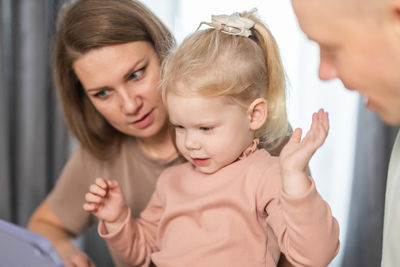 Mother and daughter at home