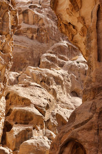 Stairs carved in sandstone rock in little petra archaeological site, jordan