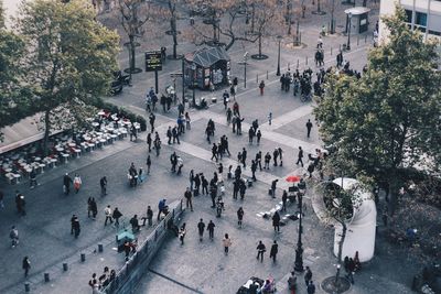 High angle view of people walking on street