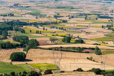 High angle view of farmland with fields for sunflower cultivation. summer time, la bureba, burgos