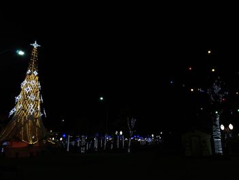 Illuminated christmas tree at night