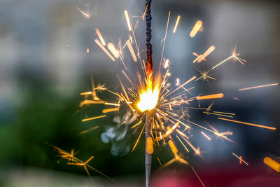 Close-up of firework display at night