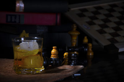 Close-up of wine glasses on table