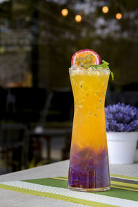 Close-up of drink on glass table