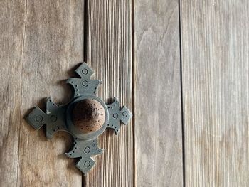 Directly above shot of rusty metal on table