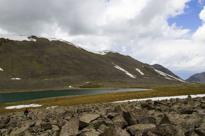 Alpine mountain lake landscape and view, snow and clouds in javakheti, georgia