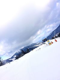 Scenic view of mountains against sky during winter