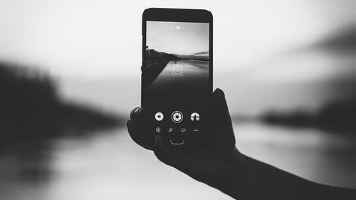 Close-up of hand holding smart phone