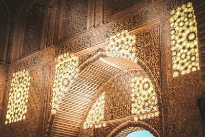 Low angle view of illuminated ceiling of cathedral