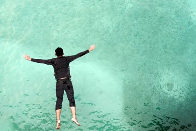 High angle view of man diving in sea