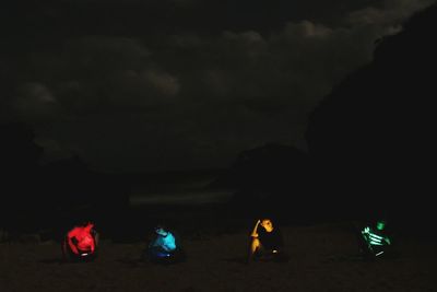 Group of people in the dark