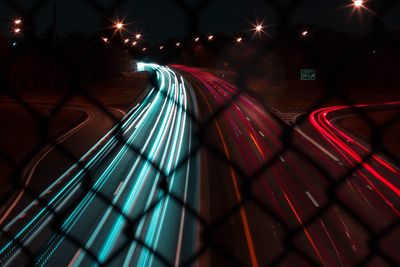 Light trails on illuminated city at night