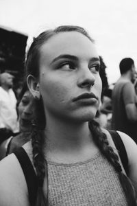 Close-up of young woman during social gathering