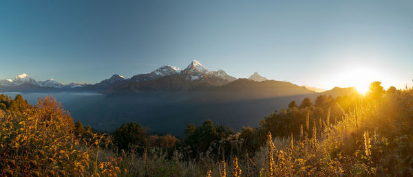 Scenic view of mountains against sky during sunset