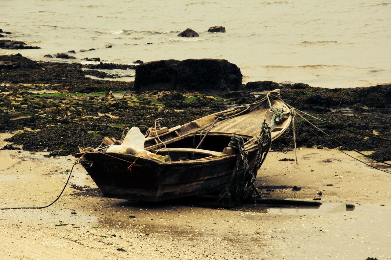 abandoned, beach, sand, transportation, nautical vessel, obsolete, boat, damaged, moored, mode of transport, shore, run-down, water, old, deterioration, sea, high angle view, day, outdoors, nature