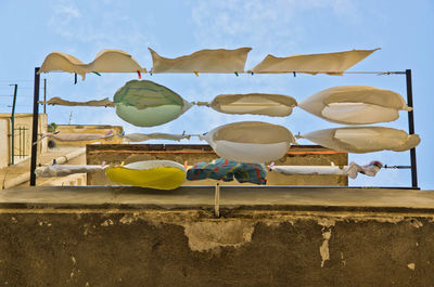 Directly below shot of laundry drying at residential building