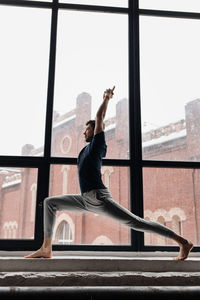 A man engaged in yoga and meditation, performing asanas