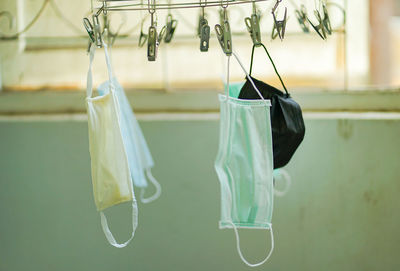 Close-up of clothes hanging on clothesline