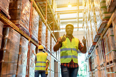 Low angle view of man working in building