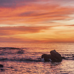 Scenic view of sea against sky during sunset