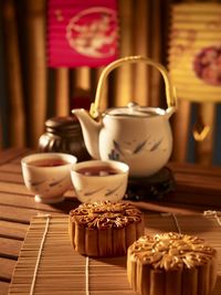 Close-up of sweet food with tea on table