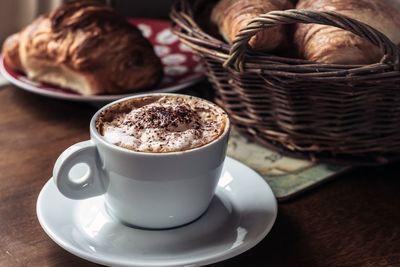 Close-up of coffee in cup on table