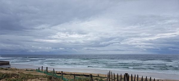 Scenic view of beach against sky