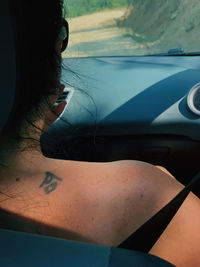 Close-up of woman in car