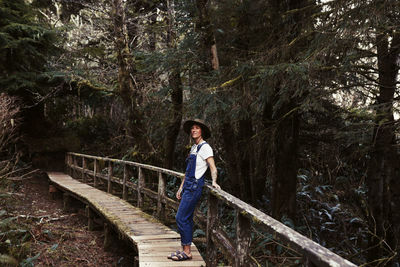 Beautiful woman in the forest near tofino
