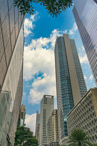 Low angle view of modern buildings against sky