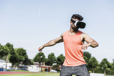 Athlete wearing virtual reality glasses