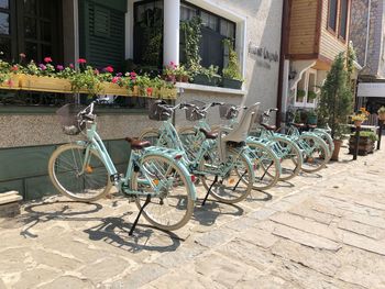 Bicycles on footpath by building