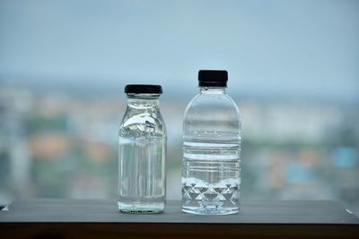 Close-up of glass bottle on table