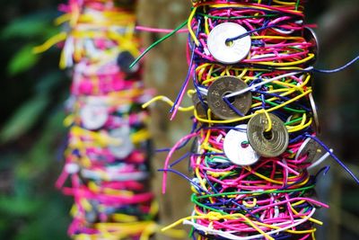 Close-up of decoration hanging on rope