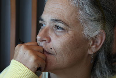 Close-up of thoughtful mature woman