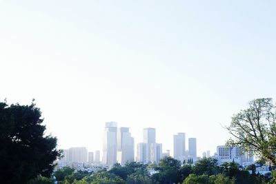 Cityscape against clear sky