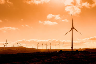 Landscape with wind turbines that produce electricity by rotating in the wind. wind farm eolic park