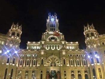 Low angle view of illuminated cathedral at night