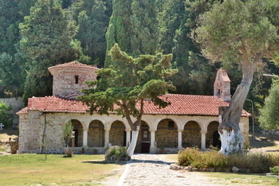 Exterior of historic building by trees