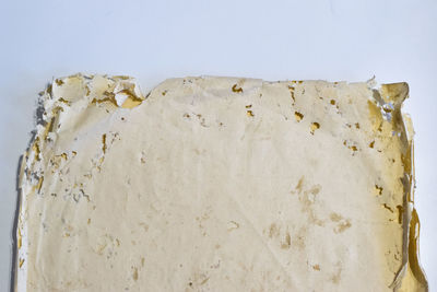 Close-up of bread on white background