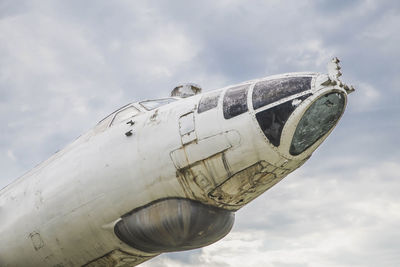 Low angle view of airplane against sky