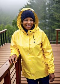 Portrait of young woman standing outdoors